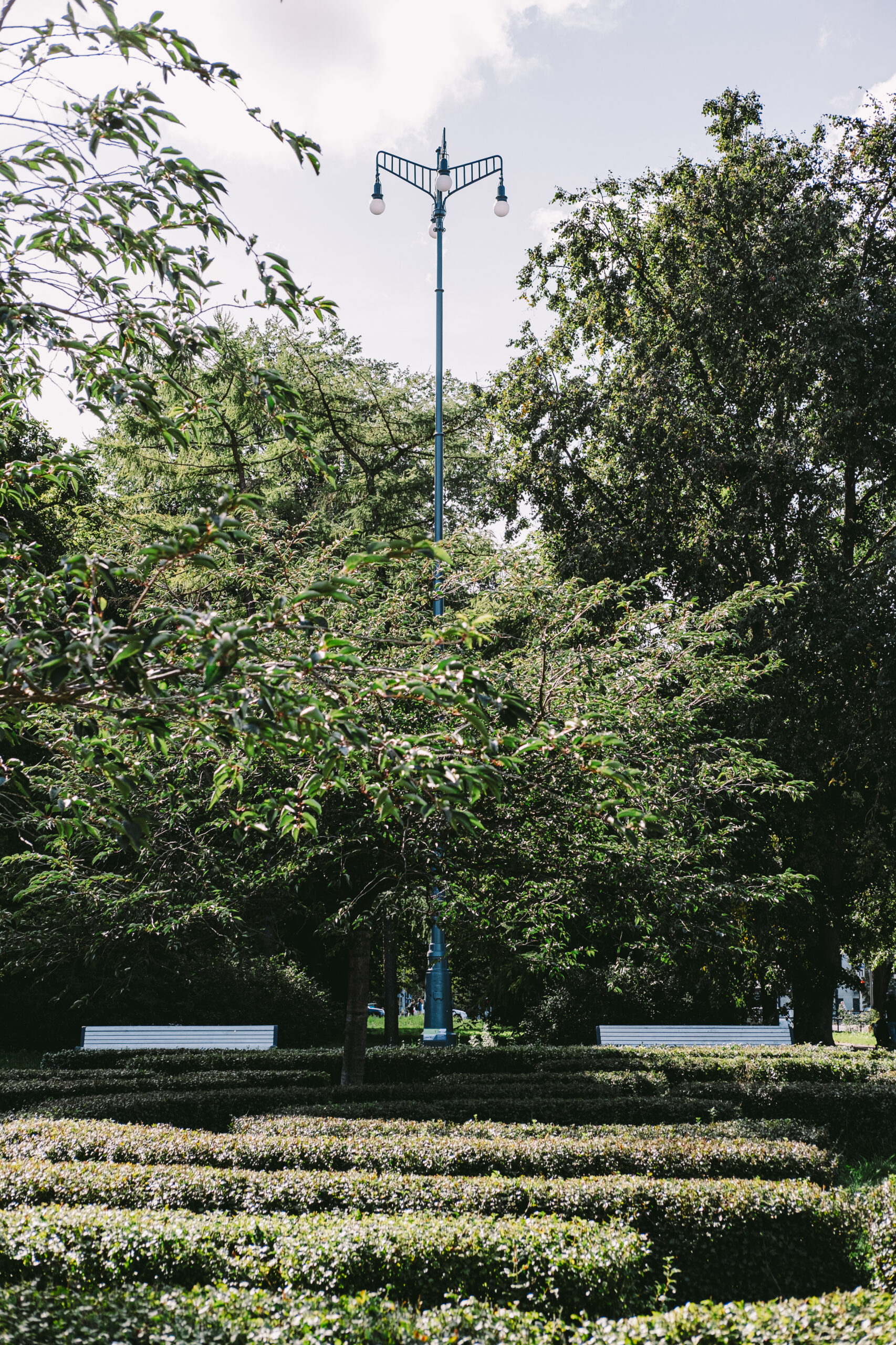 A day view up to a custom-made public space lighting fixture with an energy-efficient LED lighting solution.