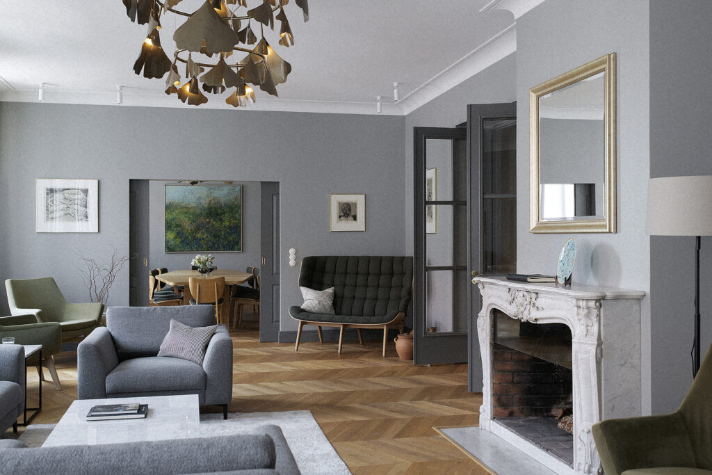 Brass ginkgo-leaf Ginko chandelier above a Stockholm living room, marble fireplace beside