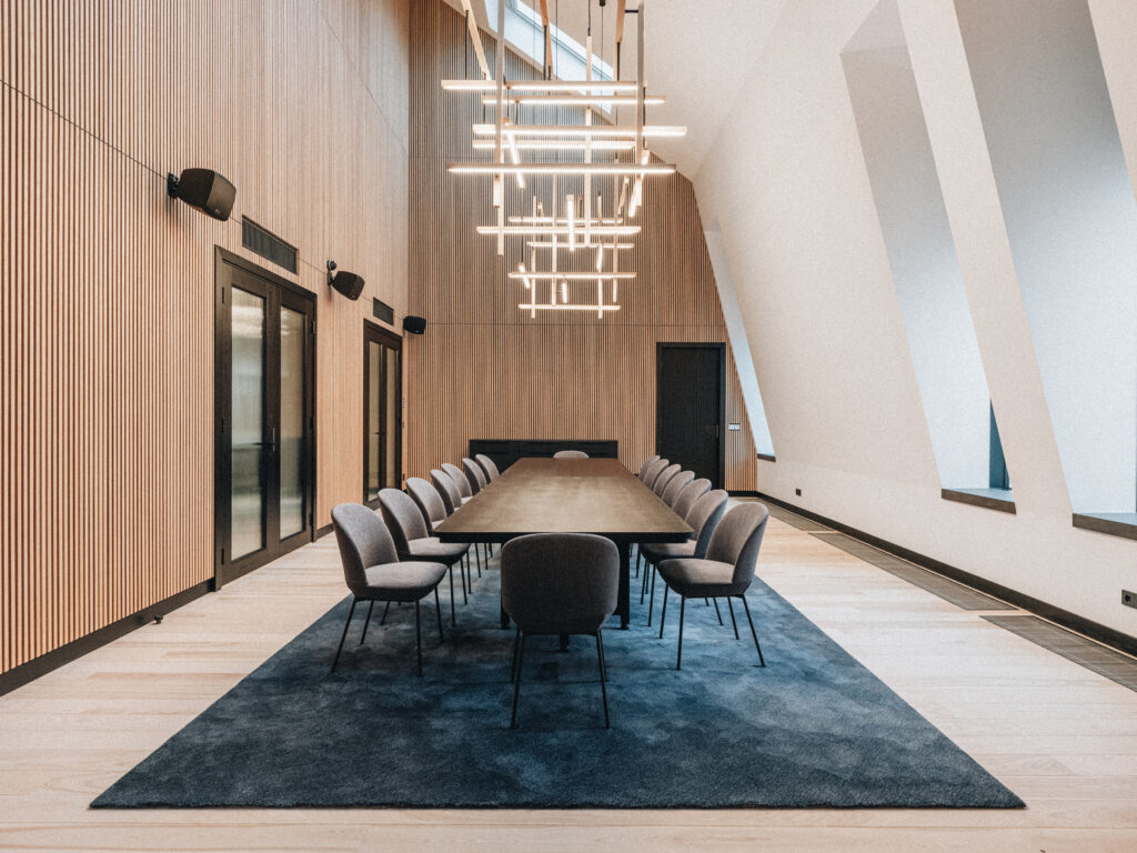 Modular Woodplay chandelier configured for the scale of an embassy hall